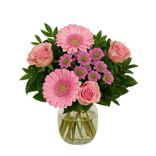 Rosa bukett med rosor, germini och krysantemum i glasvas – en charmig och romantisk blomsterarrangemang.